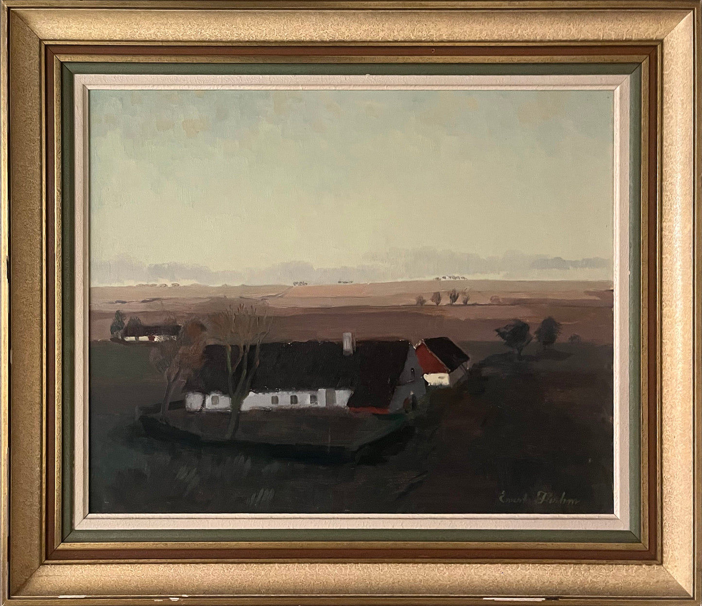 Farm buildings in a landscape