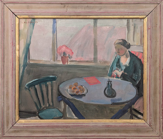 Figure Sitting at a Table