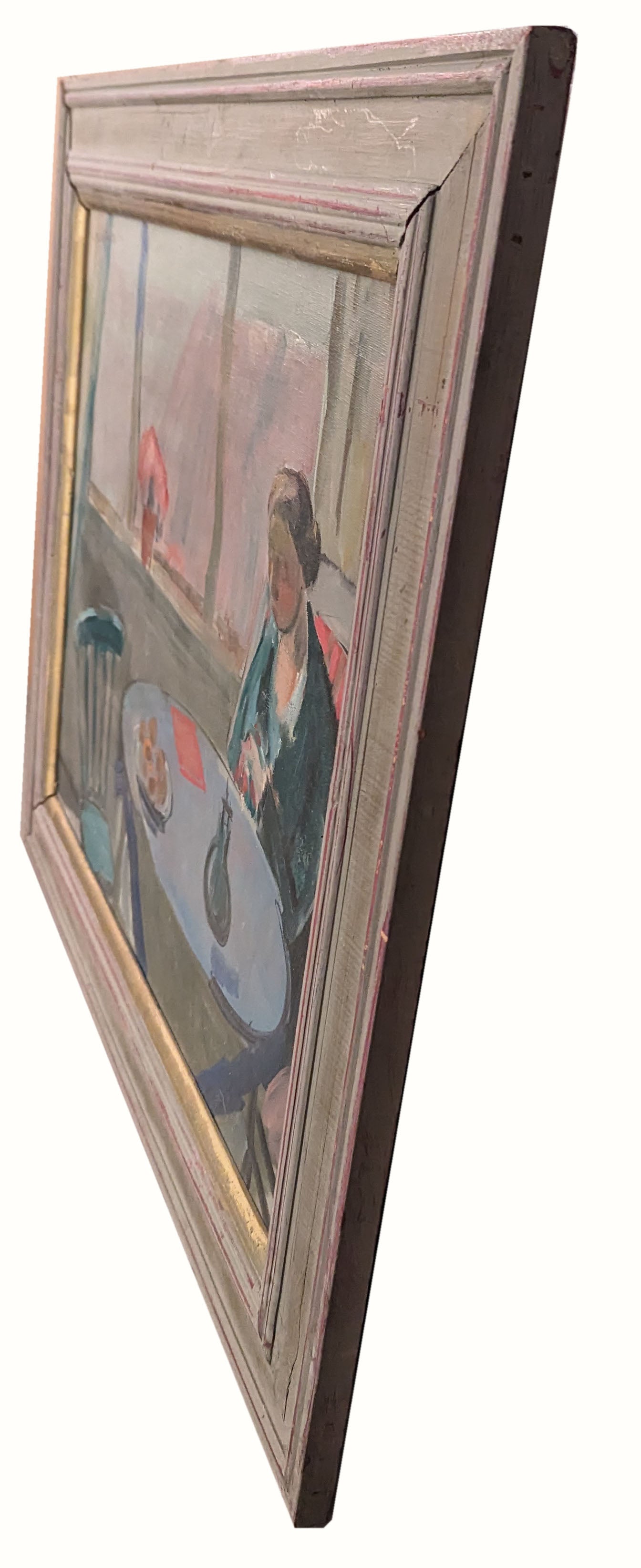 Figure Sitting at a Table