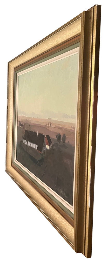 Farm buildings in a landscape